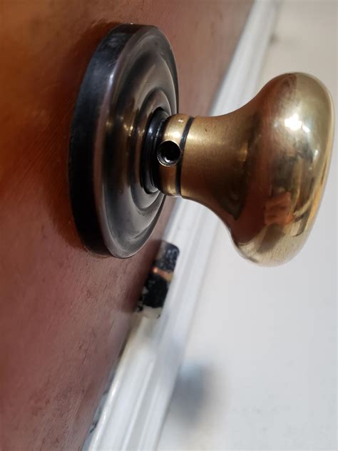 remove door knob no screws|Door knob MYSTERY! No visible screws or slot or .